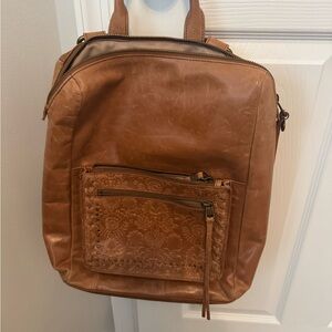 The Sak. Brown Leather Backpack with Embossed Pocket
